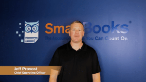 Business professional analyzing client profitability data